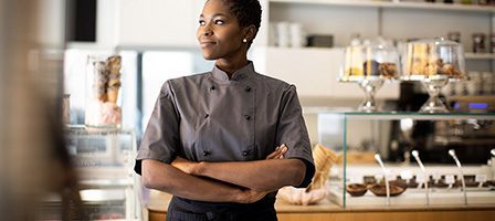 Pastry chef in dessert shop