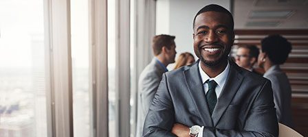 Smiling businessman in a suit