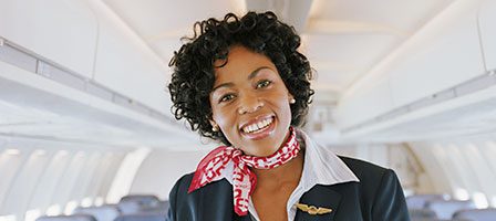 Airline staff in uniform on plane