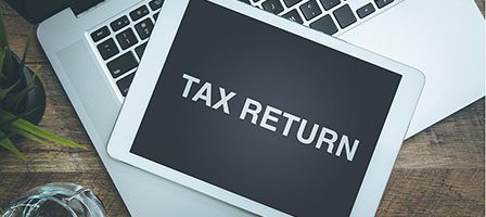 Tax return message on digital tablet
