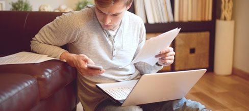 Individual working from home with technology