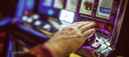 Person playing slot machine