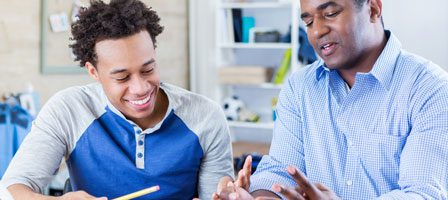 Student and teacher discussing homework