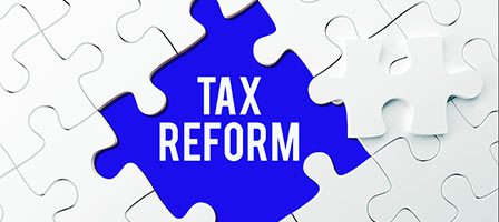 Blue puzzle piece labeled tax reform