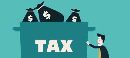 Tax burden illustration with money bags