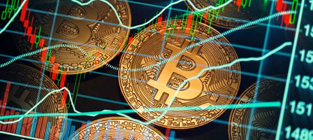 Bitcoin coins with fluctuating stock graphs
