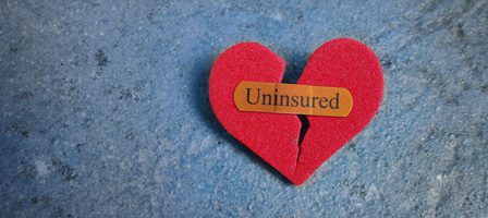 Cracked heart representing uninsured status