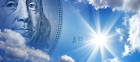 Money and sky with sunburst