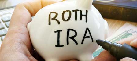 Writing Roth IRA on piggy bank