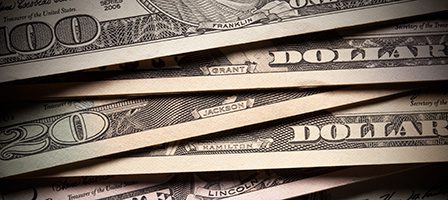 Stacked American currency notes