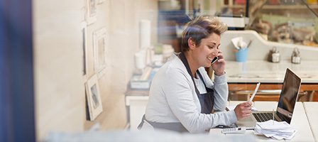 Café owner managing business tasks