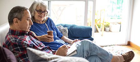 Older adults sitting and talking together