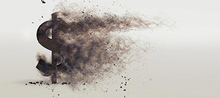 Crumbling dollar symbol in motion