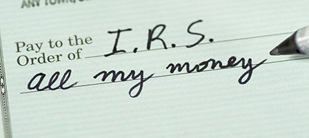 Check written to IRS with humorous message.