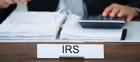 IRS nameplate and financial documents