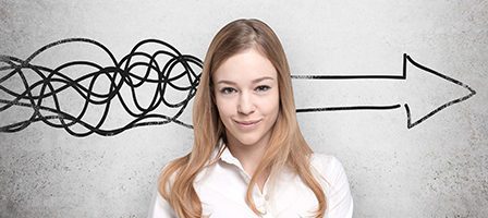 Woman in front of abstract drawing