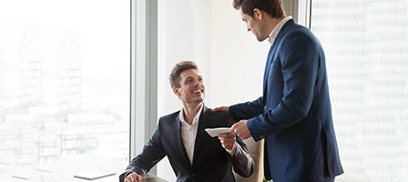 Businessmen discussing in office