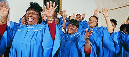 Happy choir members performing in church.