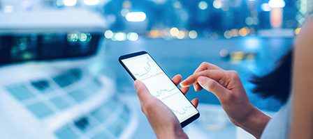 Smartphone displaying financial charts