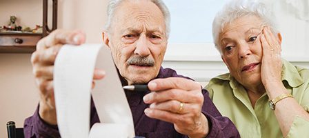 Concerned faces over financial calculations