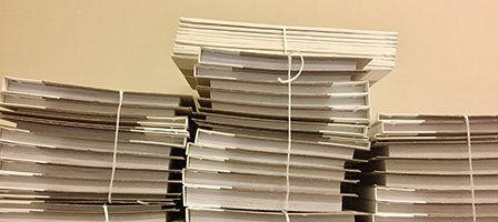 Neatly stacked documents in bundles