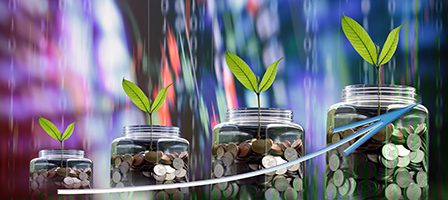 Financial growth concept with jars and plants