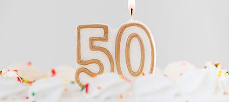 50th birthday cake with candle