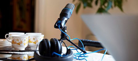 Podcast setup with microphone and headphones