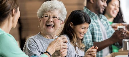 Group of people volunteering happily