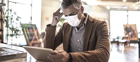 Person reading on tablet in office