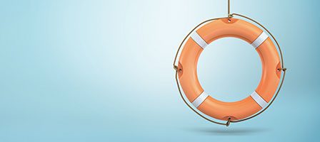 Orange life buoy on blue background