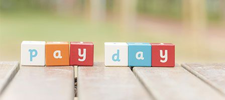 Vibrant alphabet blocks on wooden surface