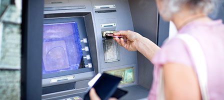 Close-up of ATM transaction