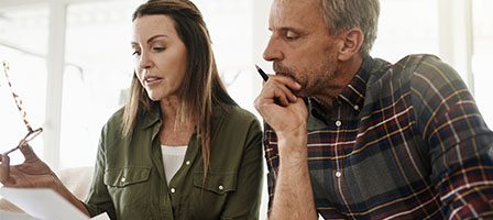Couple reviewing documents together