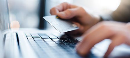 Person using laptop for payment