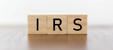 IRS letters on wooden cubes