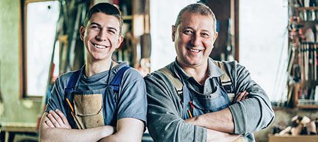 Father and son in workshop