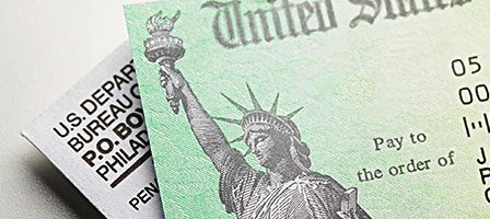U.S. Treasury check with Statue of Liberty