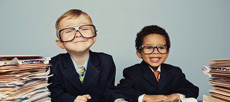 Young boys dressed in business attire