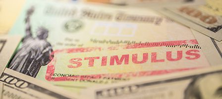 Government stimulus payment on table