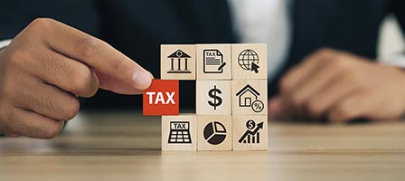 Tax concept with wooden blocks