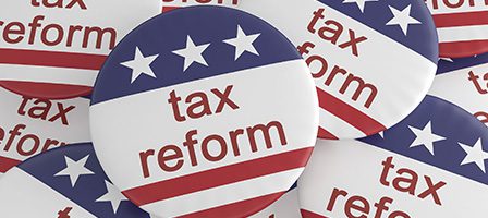 Tax reform buttons with stars and stripes.