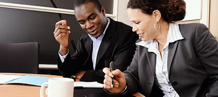 Professionals reviewing documents