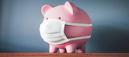 Pink piggy bank with mask
