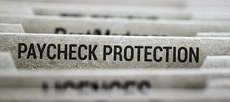 Organized files labeled Paycheck Protection