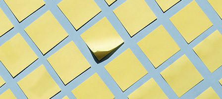 Sticky notes on blue surface