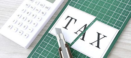 Calculator and cut tax paper