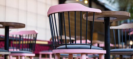 Pink chair and table in cafe