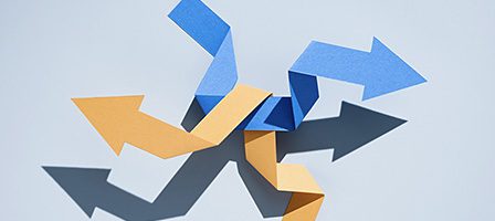 Colorful paper arrows pointing directions