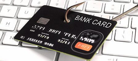 Hacked bank card on keyboard